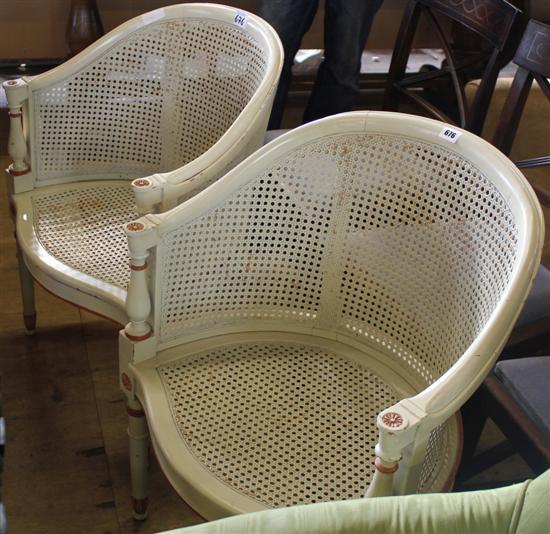 Pair of Louis XVI style white painted cane tub shape armchairs